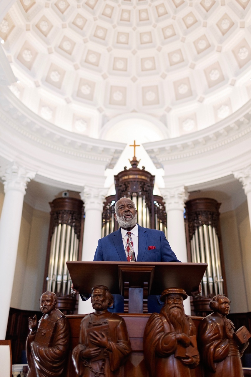 Robert Smith Jr. stands in the pulpit of Hodges Chapel.